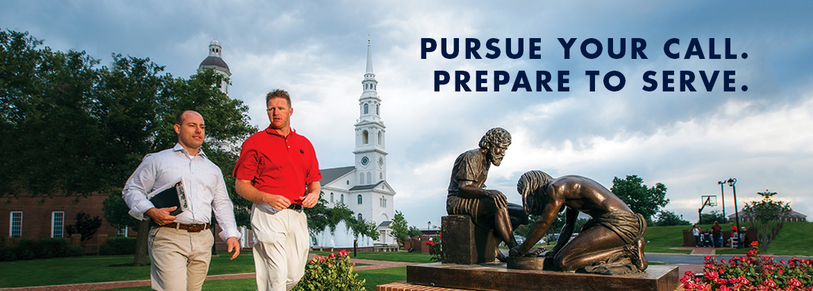 two graduate students - statue - Mahler building & chapel - pursue your call. prepare to serve.