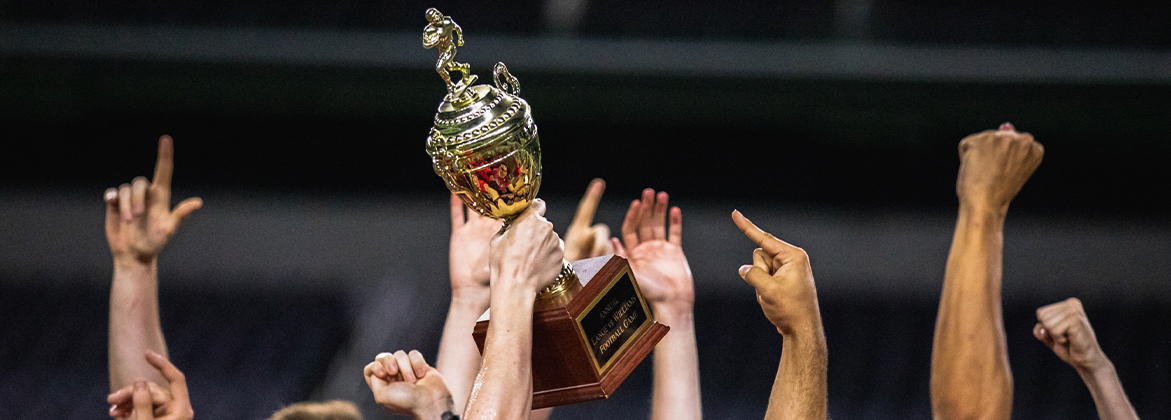 Football trophy being help up