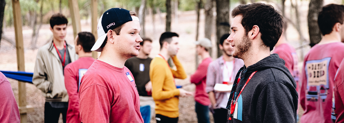 Two guys interacting during Rush Week