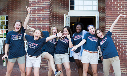 group of college girls standing outside of Spence Hall - the girls' dorm