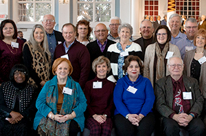 group of DBU Alumni sitting together for a picture