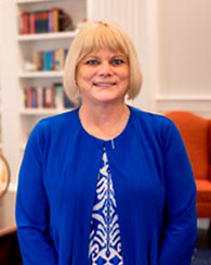 Allison Hopgood standing in the center for baptist history and heritage room located in ford village