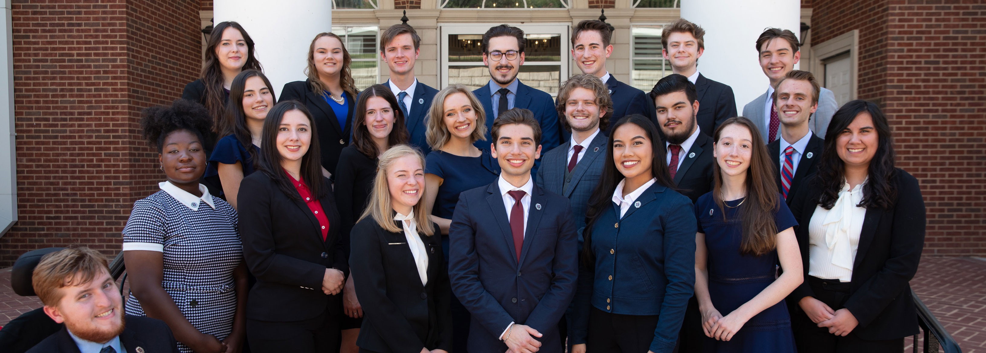 a group photo of the debate team