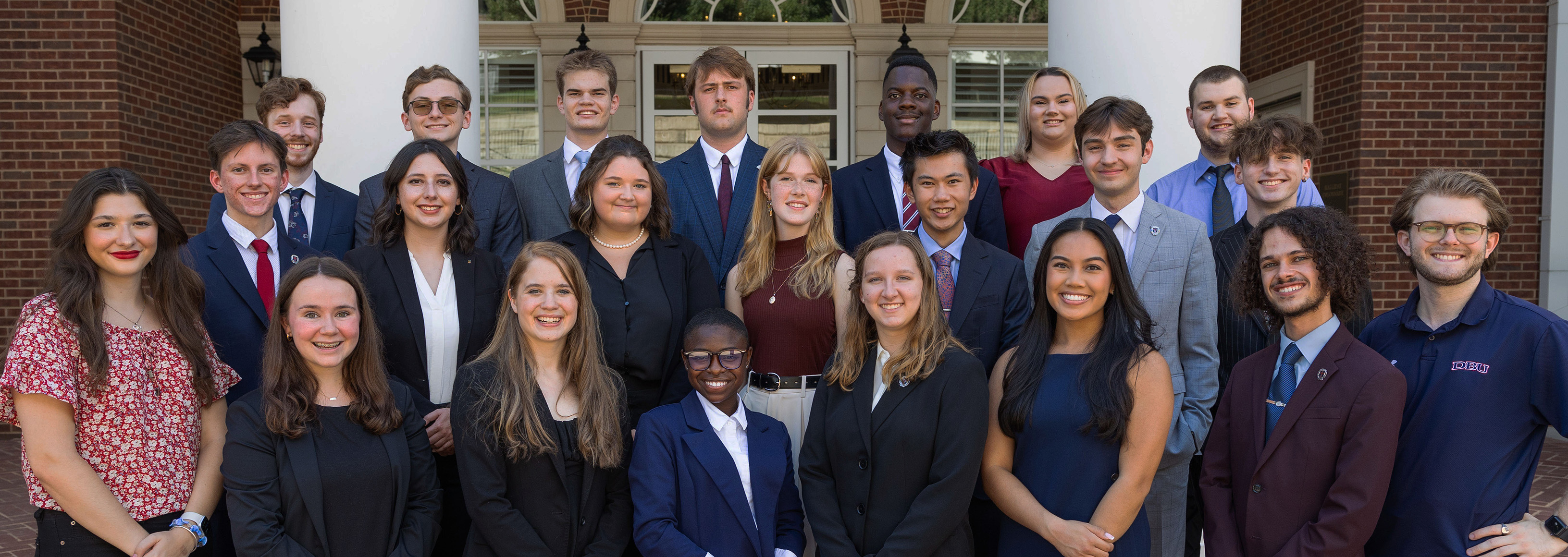 a group photo of the debate team
