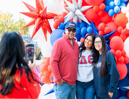 family at homecoming tailgate