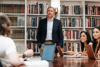 professor teaching to students at a dallas college