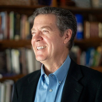 headshot of Sam Brownback