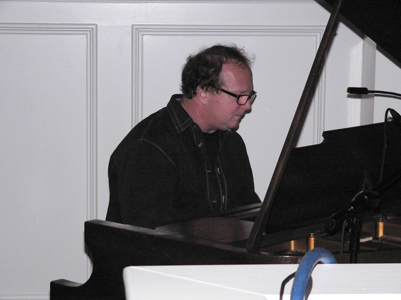 picture of Charlie Peacock playing piano