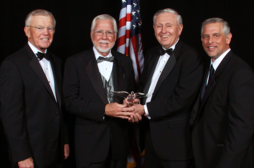 Dallas Baptist University hosted the 24th Annual Russell H. Perry Free Enterprise Dinner on Monday, November 7 at the Anatole Hotel in Dallas. Pictured: Joe Gibbs, dinner speaker; Norm Miller, 2011 recipient of the Russell H. Perry Free Enterprise Award; Boone Powell, Jr., honorary chair of the dinner committee; and Mike Arnold, chair of the dinner committee.