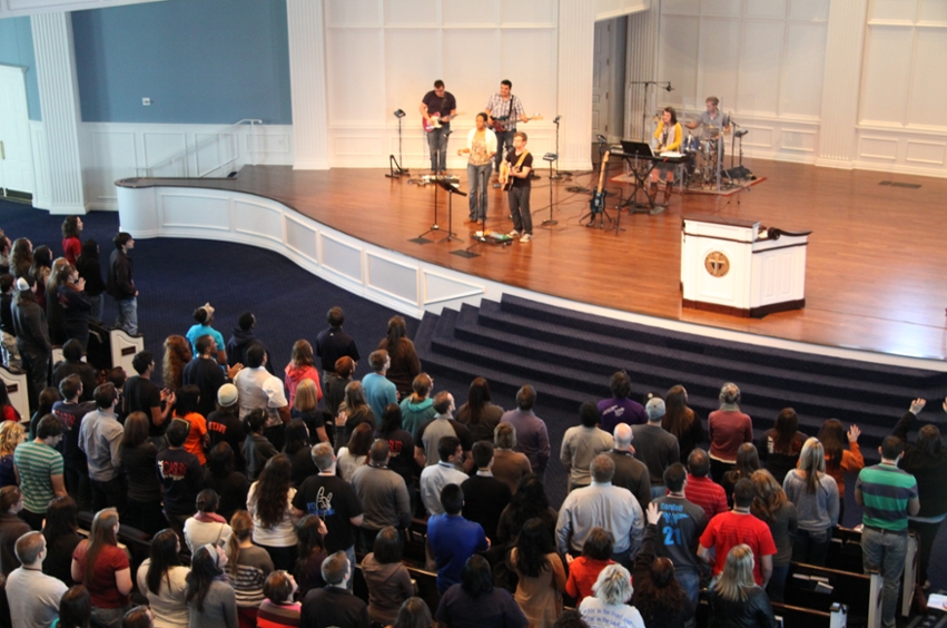 Students attending CASL 2012 worship in the Pilgrim Chapel at Dallas Baptist University during a general session.