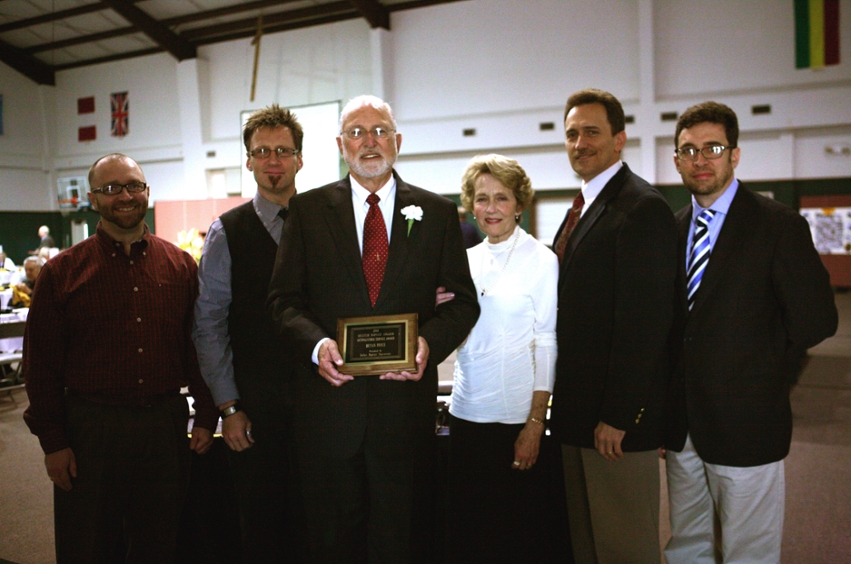 Bryan Price (center) was the recipient of the Distinguished Service Award at the Decatur Baptist College Spring Reunion. The Price family, pictured (left to right) Vance, Kevin, Bryan, Lorna, Philip, and Sean.