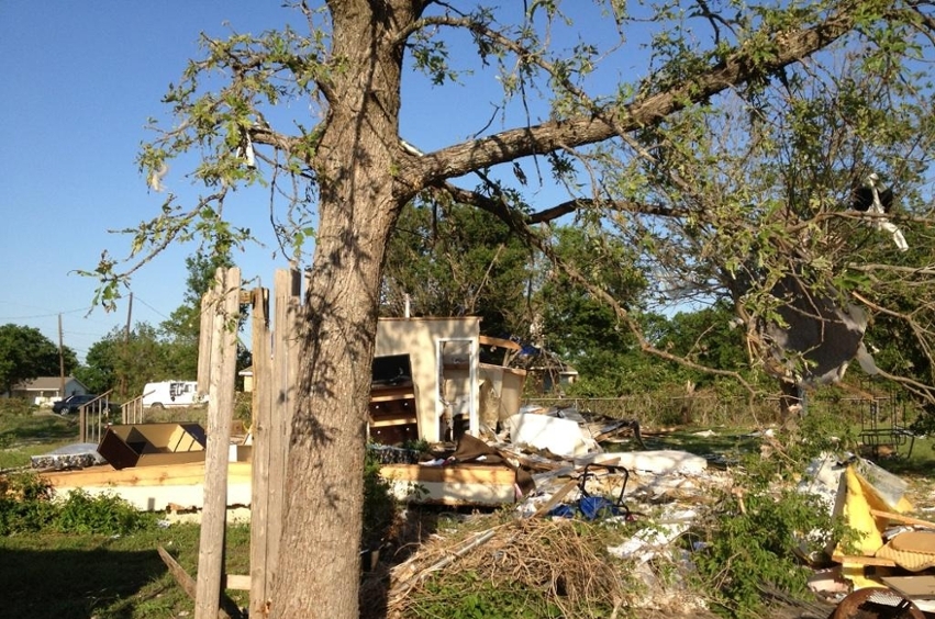 DBU students helped clear brush and debris from this home that was destroyed by the tornado.