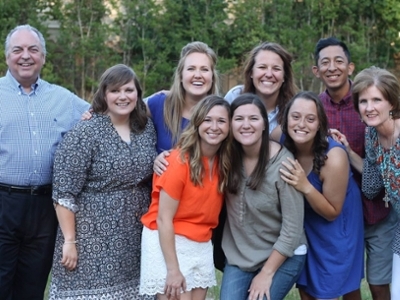 Dr. Bob Brooks, Dean, and Dr. Shelley Melia pose with a group of sky ranch leaders