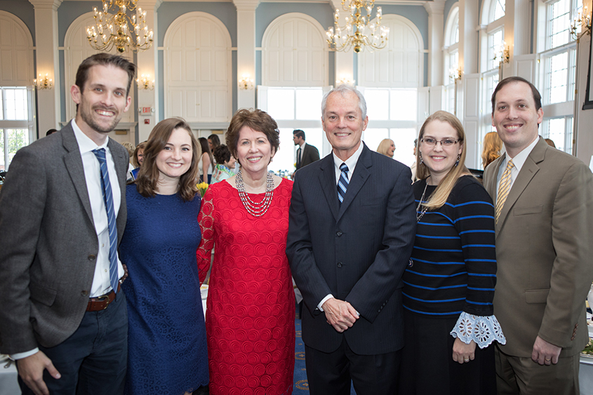 Dr. and Mrs. Gary Cook (center) along with their sons (far left) Mark Cook and his wife Shannon and (far right) Dr. David Cook and his wife, Nicole.