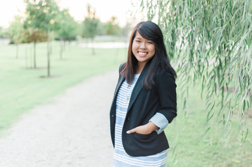 Steffy Andina standing outside on a trail