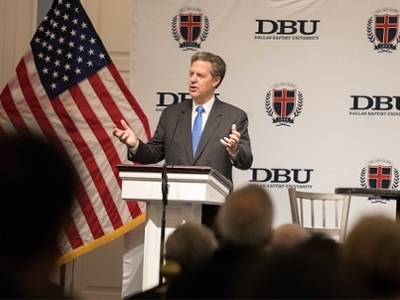 Ambassador Brownback addresses the crowd from stage