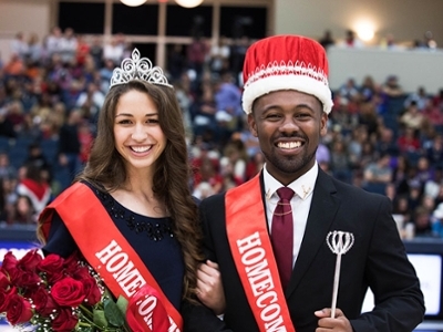 The Homecoming King and Queen pose for a photo