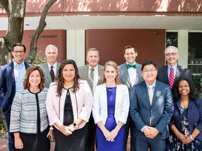 Dr. Norma Hedin, Provost,  with new faculty members