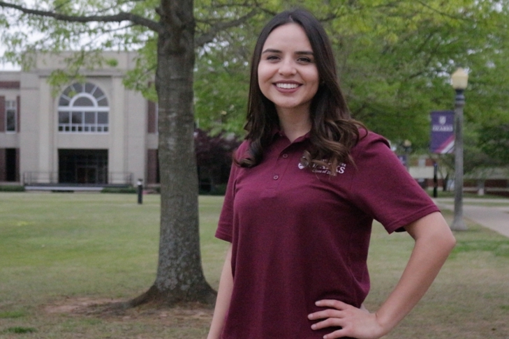 Kathleen standing outside in Arkansas