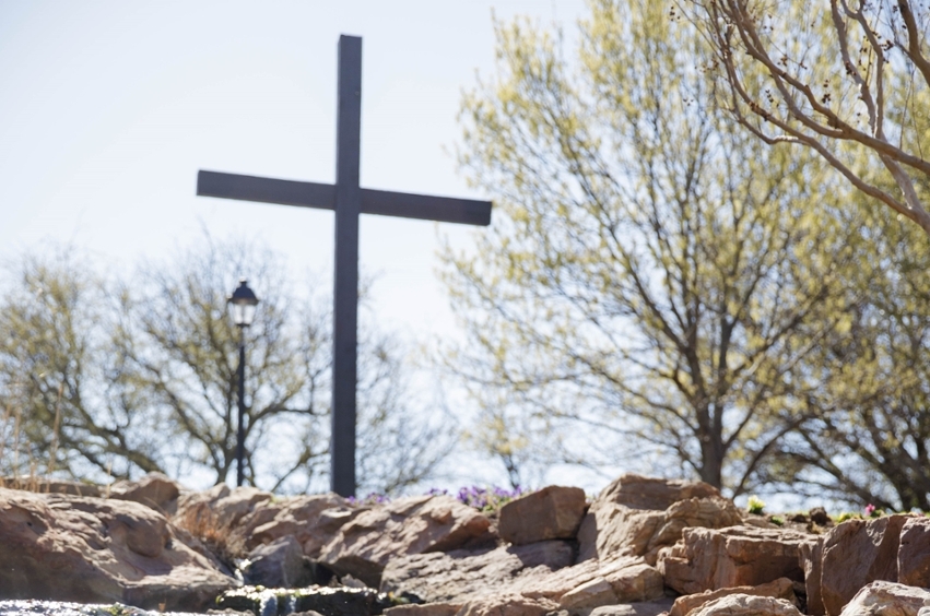 Cross by fountain