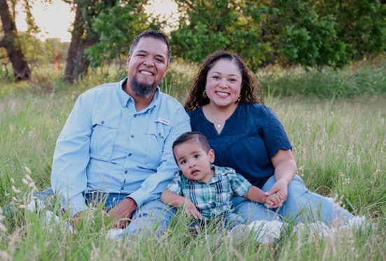 picture of Dr. Galleos with her husband and son