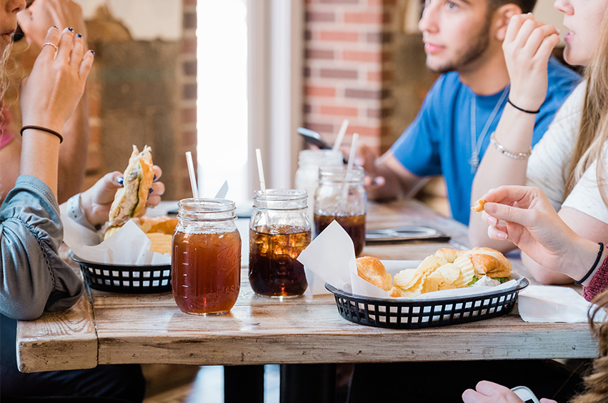 people enjoying a meal at a dallas restaurant