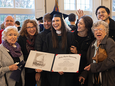 winter commencement - dbu grads celebrating in the great hall