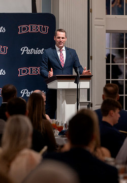 DBU Head Baseball Coach Dan Heefner encouraging the team