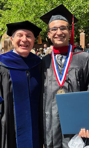 Dr. Mark Alexander standing with William Horton