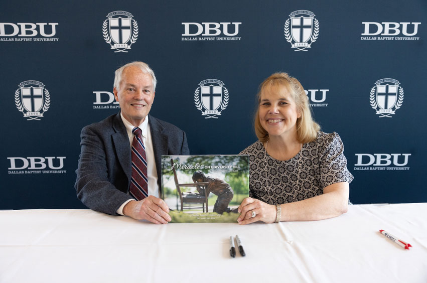 Dr. Mary Nelson and Dr. Gary Cook debuting the new book "Miracles on University Hill" in the Great Hall on the DBU campus in Dallas