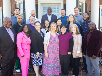 Cohort XX on the DBU campus celebrating the 20th cohort to study in the Cook School of Leadership