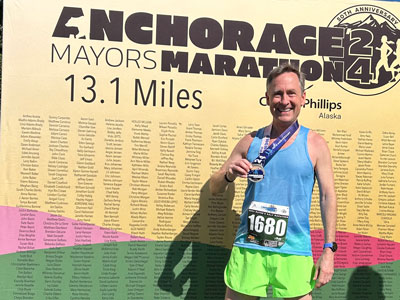 DBU Staff Member Mitch Bennett after running a half-marathon in all 50 states