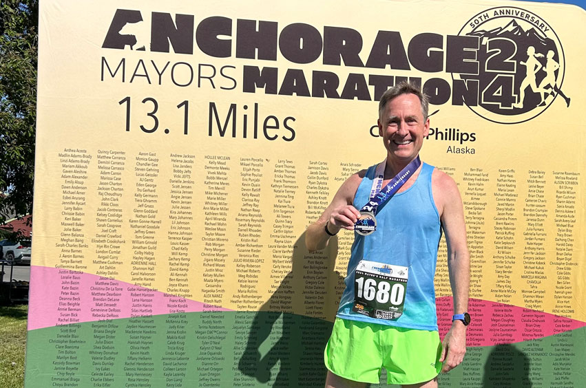 DBU Staff Member Mitch Bennett after running a half-marathon in all 50 states