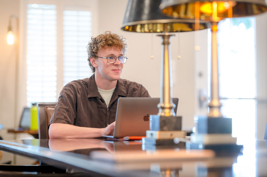 DBU student studying on campus in the DBU coffeehouse