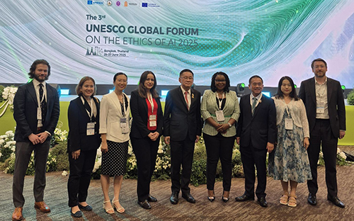 group of people standing at the event in Thailand