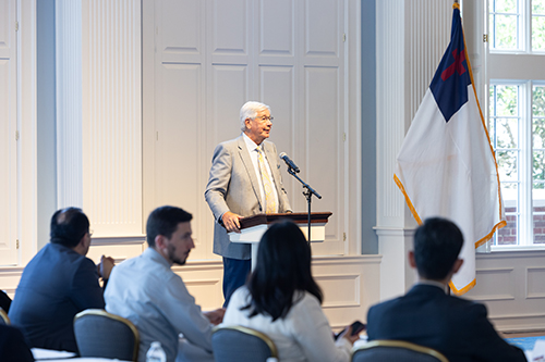 Dr. Randel Everett speaking at event