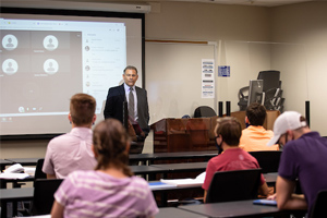 professor teaching in classroom